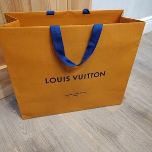 Louis Vuitton authentic iconic paper gift bag with handles. 15.5x14.5x6.5 Empty